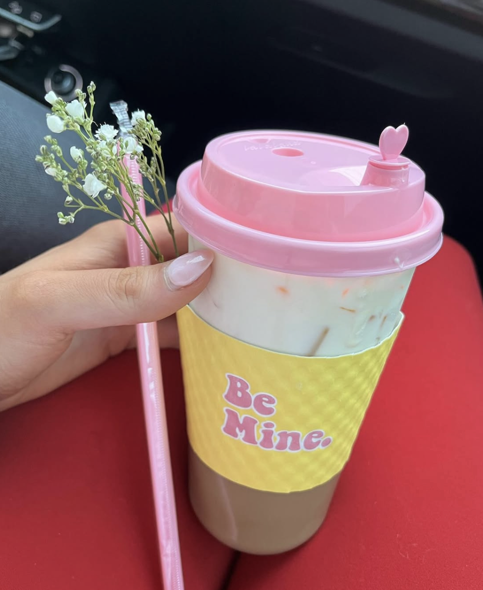 The La La Latte on Valentine's Day with a cute flower and Be Mine wrap around the cup. 